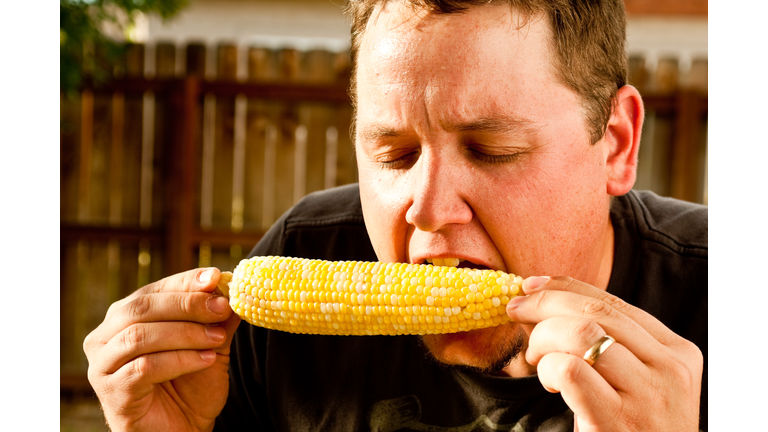 Man Eating Corn on the Cob