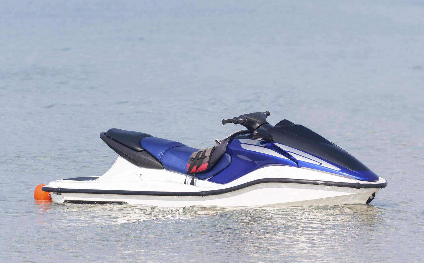 Jet ski moored on water Close up