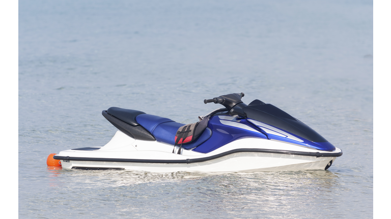 Jet ski moored on water Close up