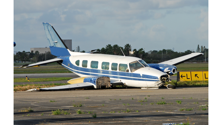 Crash landed propeller airplane