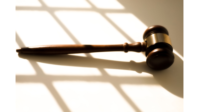 judge’s traditional wooden gavel on white background & shadow detail