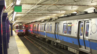 Teen survives after being pushed into a moving subway train.