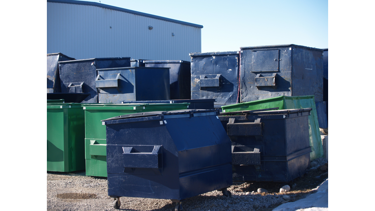 Many Garbage Dumpsters