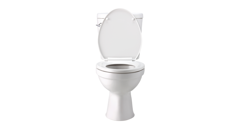 White toilet bowl in bathroom, isolated with clip path