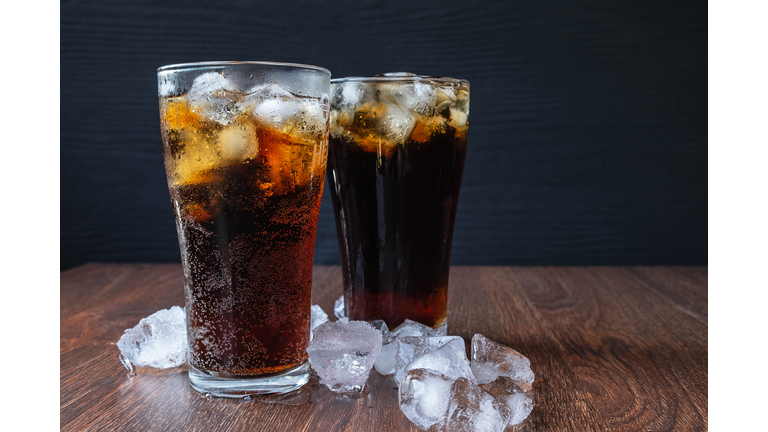 Close-up of beer glasses on table