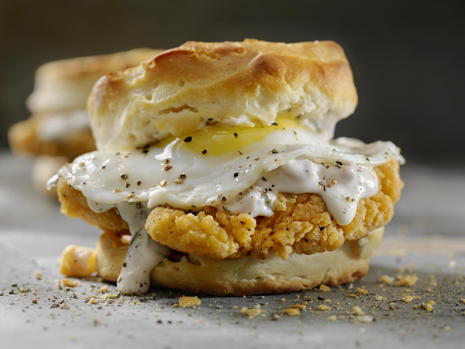 Fried Chicken Sandwich with a Fried Egg,Sausage Gravy on a Biscuit