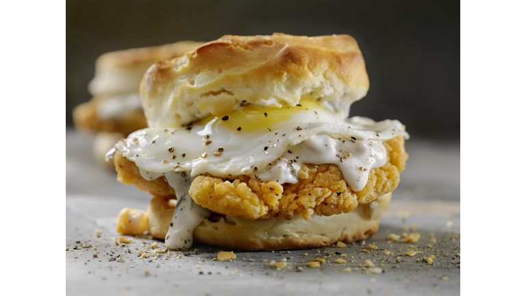 Fried Chicken Sandwich with a Fried Egg,Sausage Gravy on a Biscuit