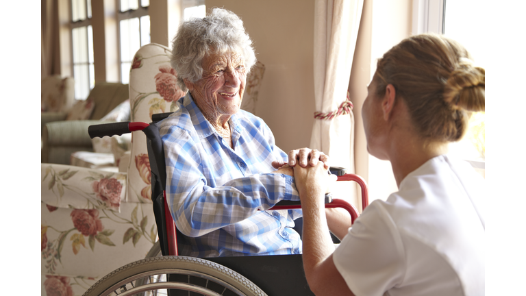 Elderly woman in a private retirement home