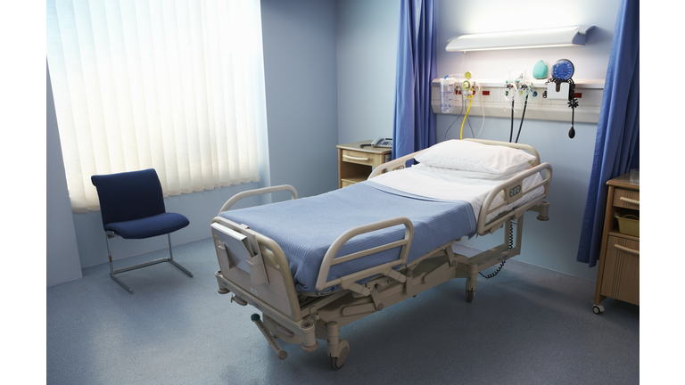 Empty Hospital Bed in a Ward