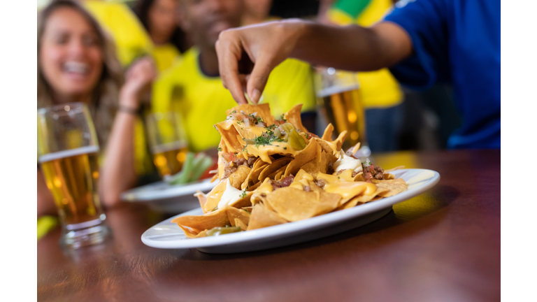 Close up on nachos at a sports bar