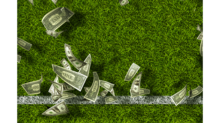 Green grass with dollar bills. Gambling thoughts.