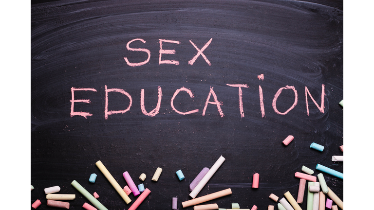 The word sex education written in chalk