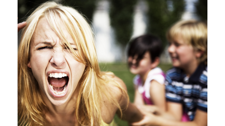 A mom going crazy while playing with her children