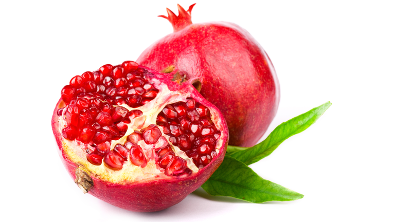 Halved pomegranate with interior view of seeds