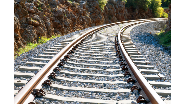 Low angle view of train track curve