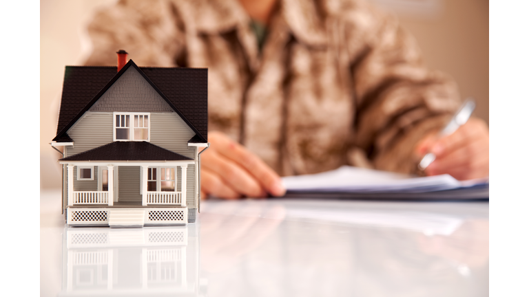 Marines Uniformed Personel with Real Estate Paperwork