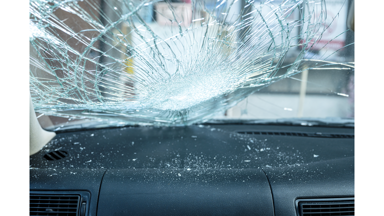 Inside of broken car windshield in car accident.