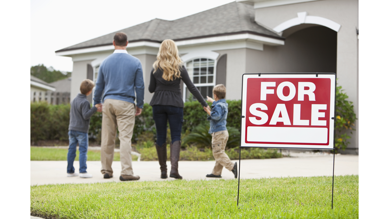 Family looking at house for sale