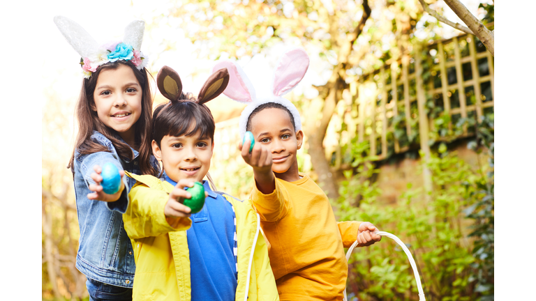 Children having fun on an Easter Egg hunt.