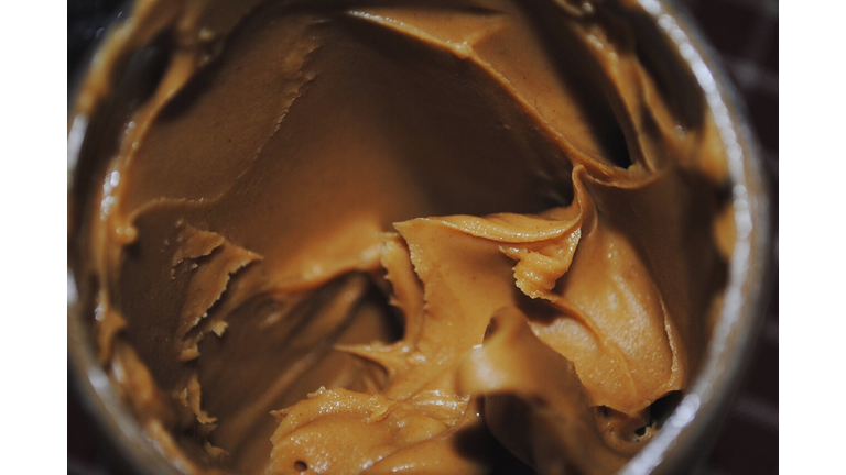 Close-Up Of Peanut Butter In Jar