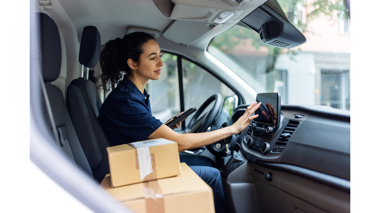 Delivery person using car GPS to determine customer's address