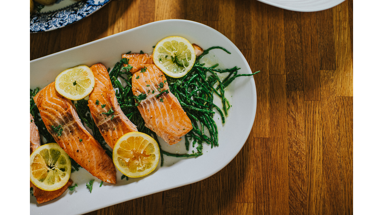 Salmon on a serving plate on a table