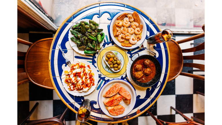 Various tapas served in a tapas bar, directly above view