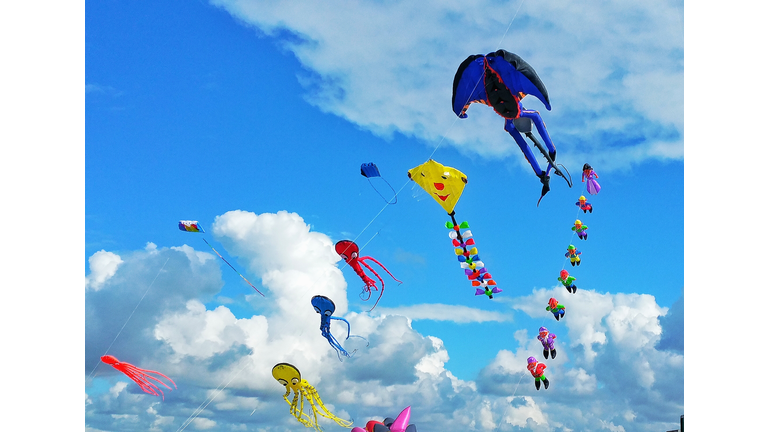 Low Angle View Of Kites Flying In Sky