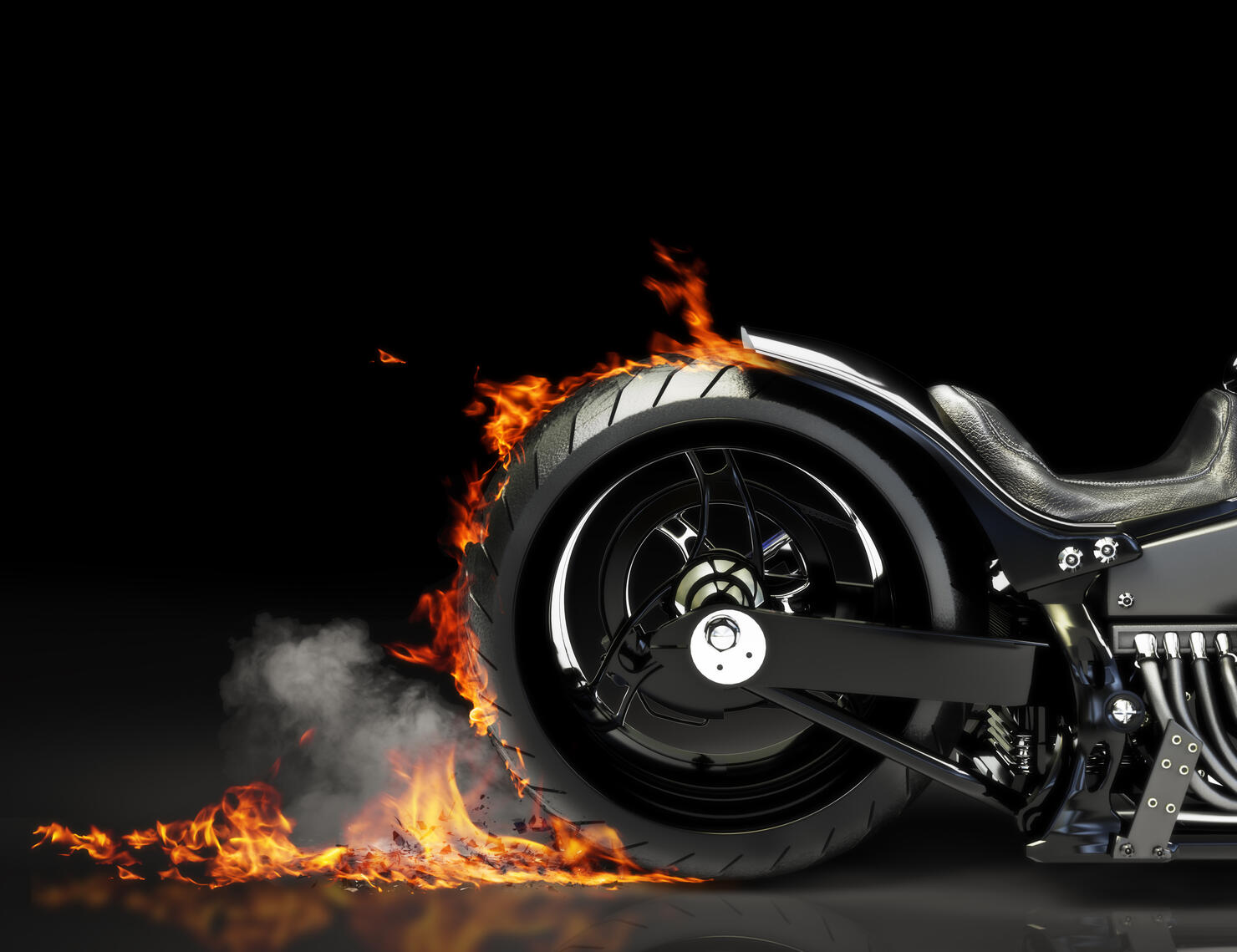 Custom motorcycle burnout on a black background