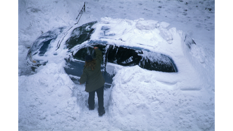 Digging Minivan Out of Snowdrift