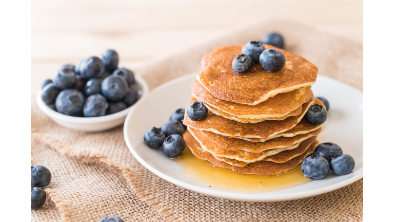 Close-up of pancakes in plate on table