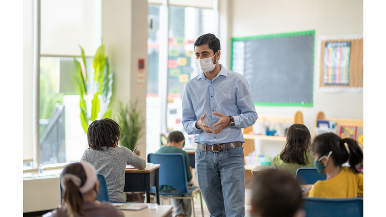 Masked School Teacher Stock Photo