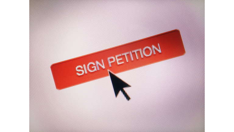 Close-Up Of Cursor On Sign Petition Icon
