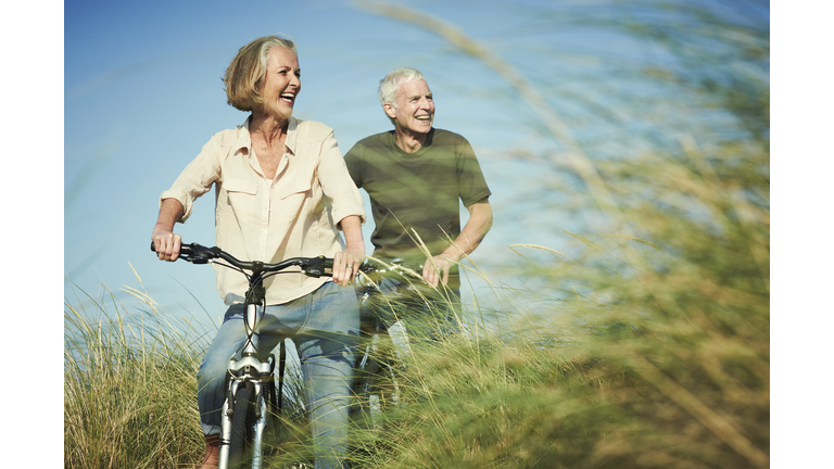 Senior couple enjoying day out on their bicycles