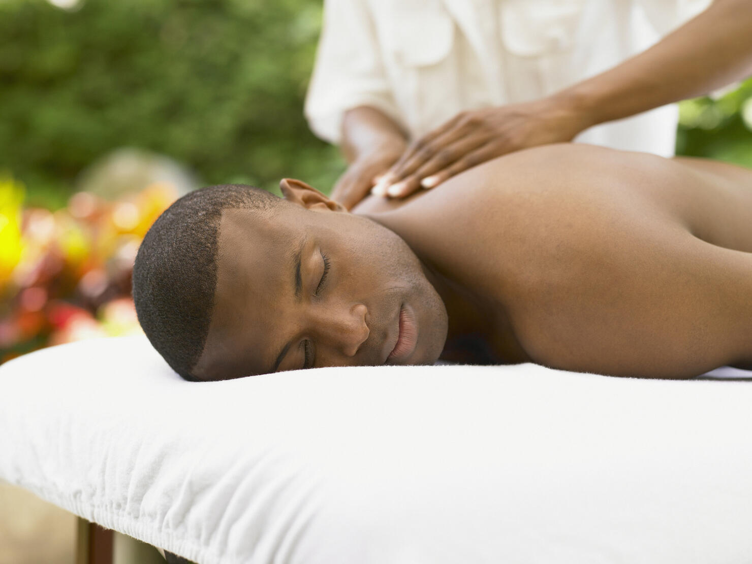 Young man having a back massage