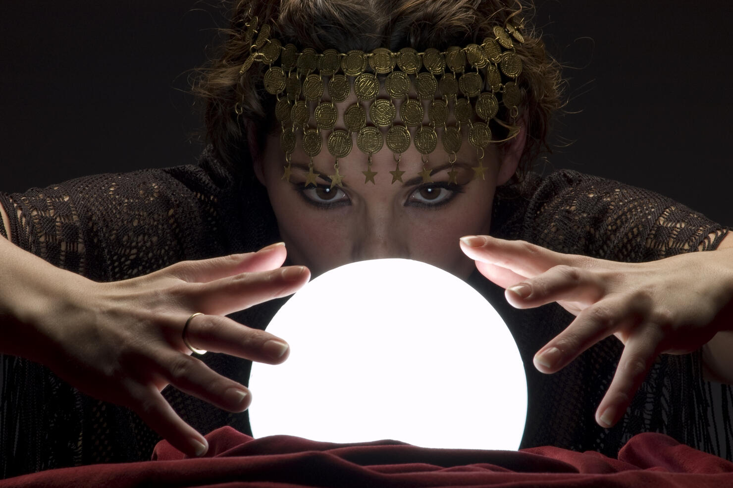 fortune teller with glowing crystal ball