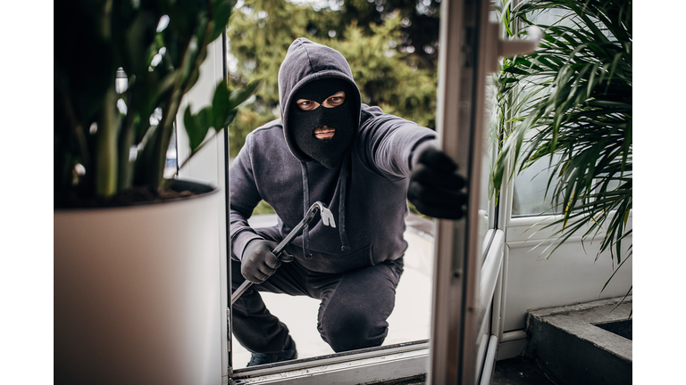 Robber breaking in house