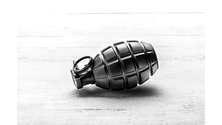 Close-Up Of Hand Grenade On Table