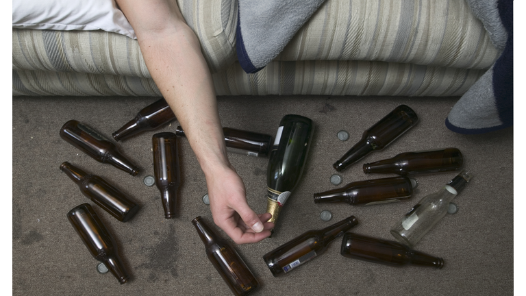 Drunk Man and Beer Bottles