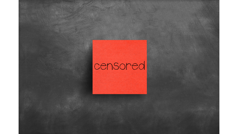 Sticky note on blackboard, Censored
