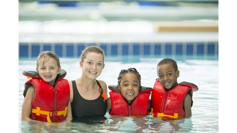 Children with Their Swim Instructor