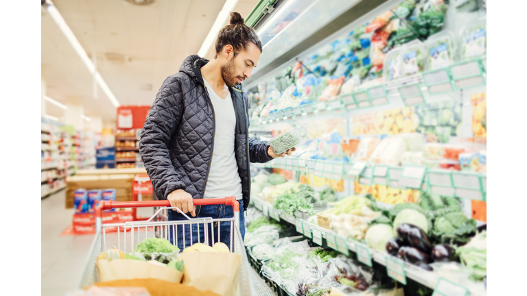 Young Man Groceries Shopping