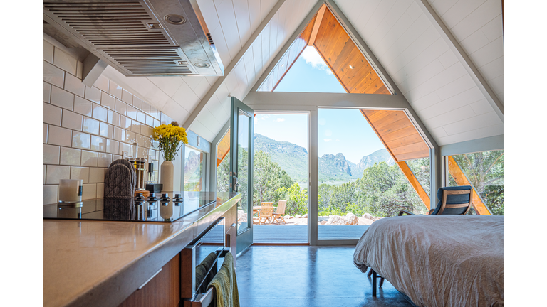 Wide Angle Real Estate Interior Shot of a Beautiful, Trendy A-Frame Tiny Home in Western Colorado with a View of Unaweep Canyon along Highway 141 in Western Colorado