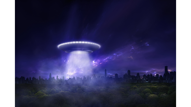Alien spaceship landing in urban park