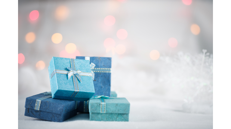 Close-Up Of Christmas Gifts On Table