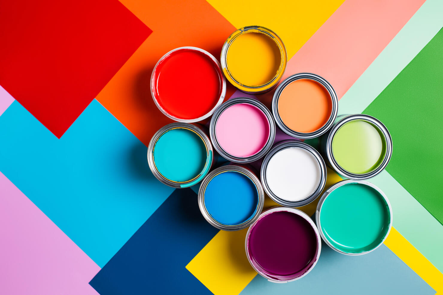 Various bright paints on colorful background