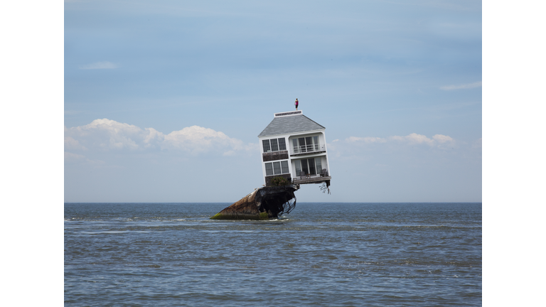 House perched above flood