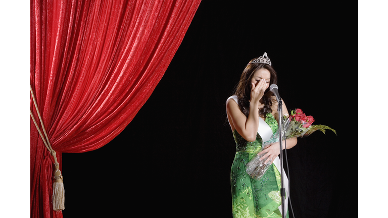 Hispanic beauty pageant winner crying on stage