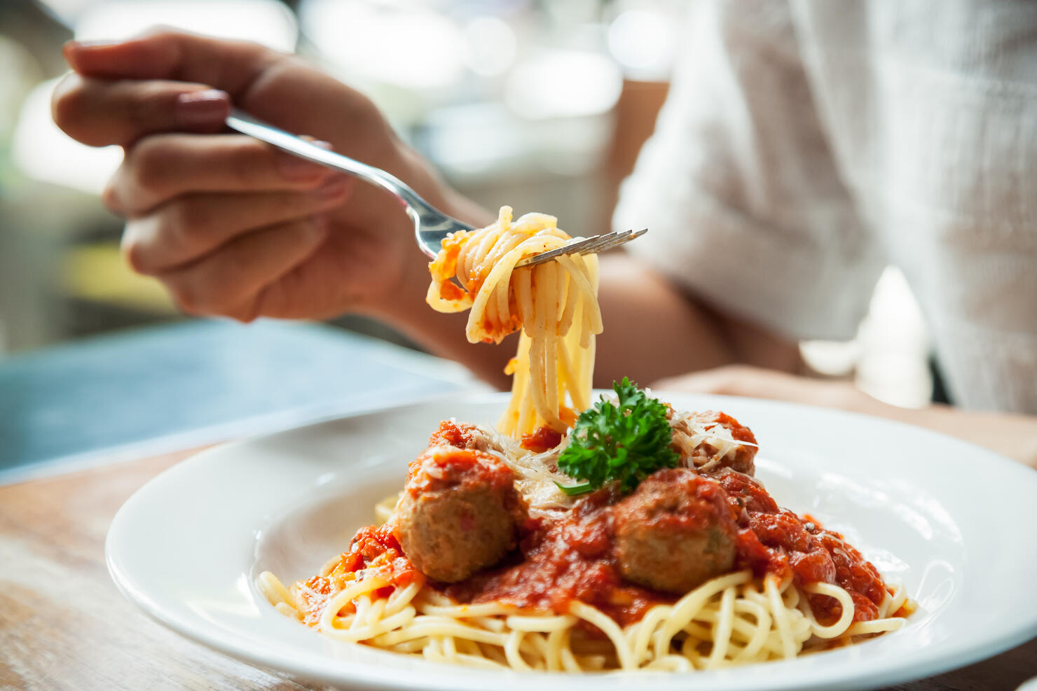 woman eating spaghetti