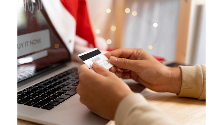 Close up hands with credit card buying online. Online shopping. cyber monday.